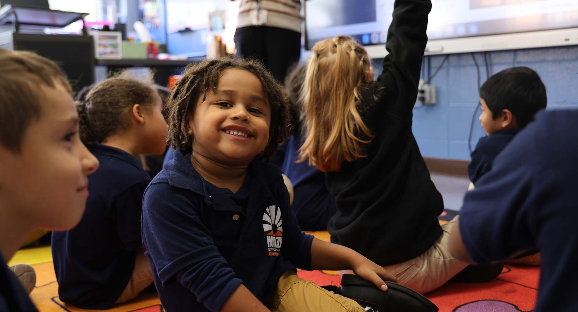 Teacher helping student
